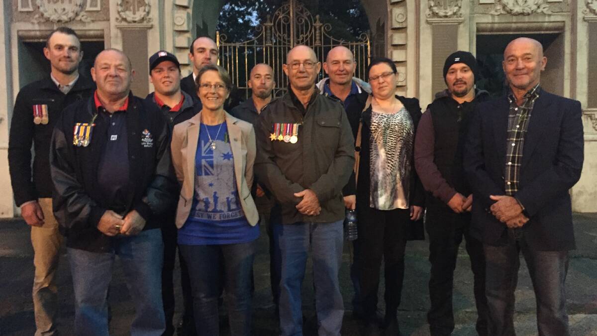 LEST WE FORGET: Members of the Lucas family gather at the 2017 Bega Anzac Day Dawn Service to pay respect to Grandfather Henry and his nine sons who served in WW2.