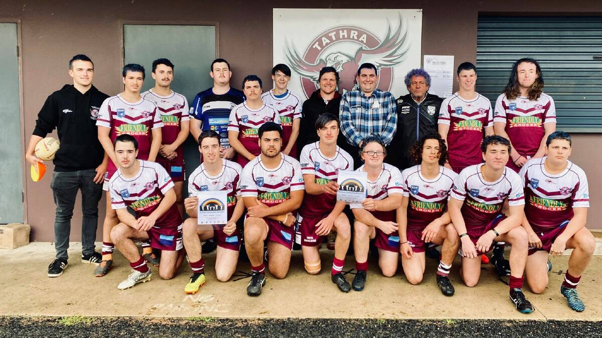 The Tathra Sea Eagles blue-haired under 18s squad with Adam Elliott's brother James and their dad on Saturday.