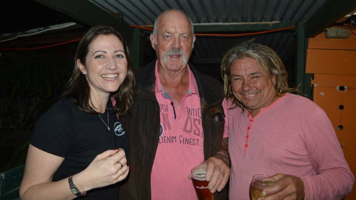 THIRD TIME LUCKY: Susan Gray, Garry Whiffen and Dean Smith celebrate "New Year's Eve" at Tilba's Dromedary Hotel on Saturday after the first two attempts were cancelled.