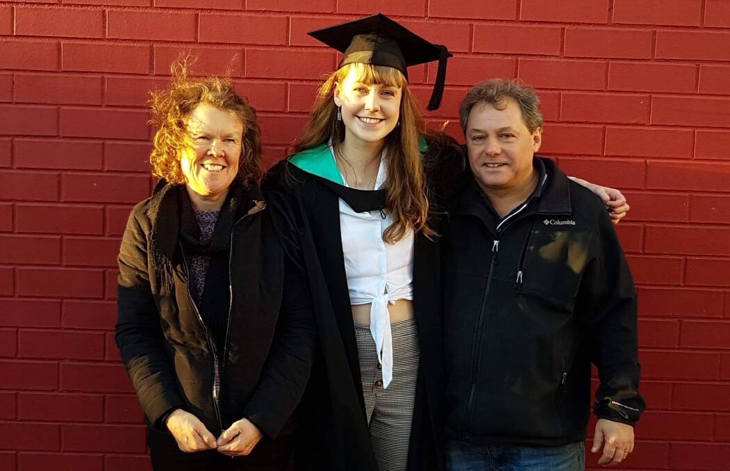 Former Bega High student Angela Stoddard (with parents Sue and Mark), recently graduated from ANU with a Bachelor of Science (Advanced) with First Class Honours. 
