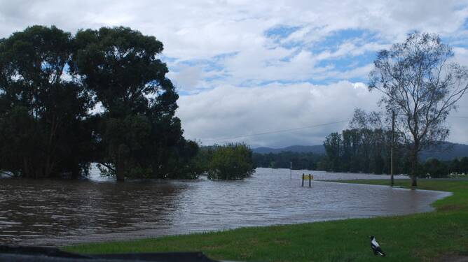 BIG WET: The road to Tathra in flood during one of the numerous big rain events experienced by the Bega district.