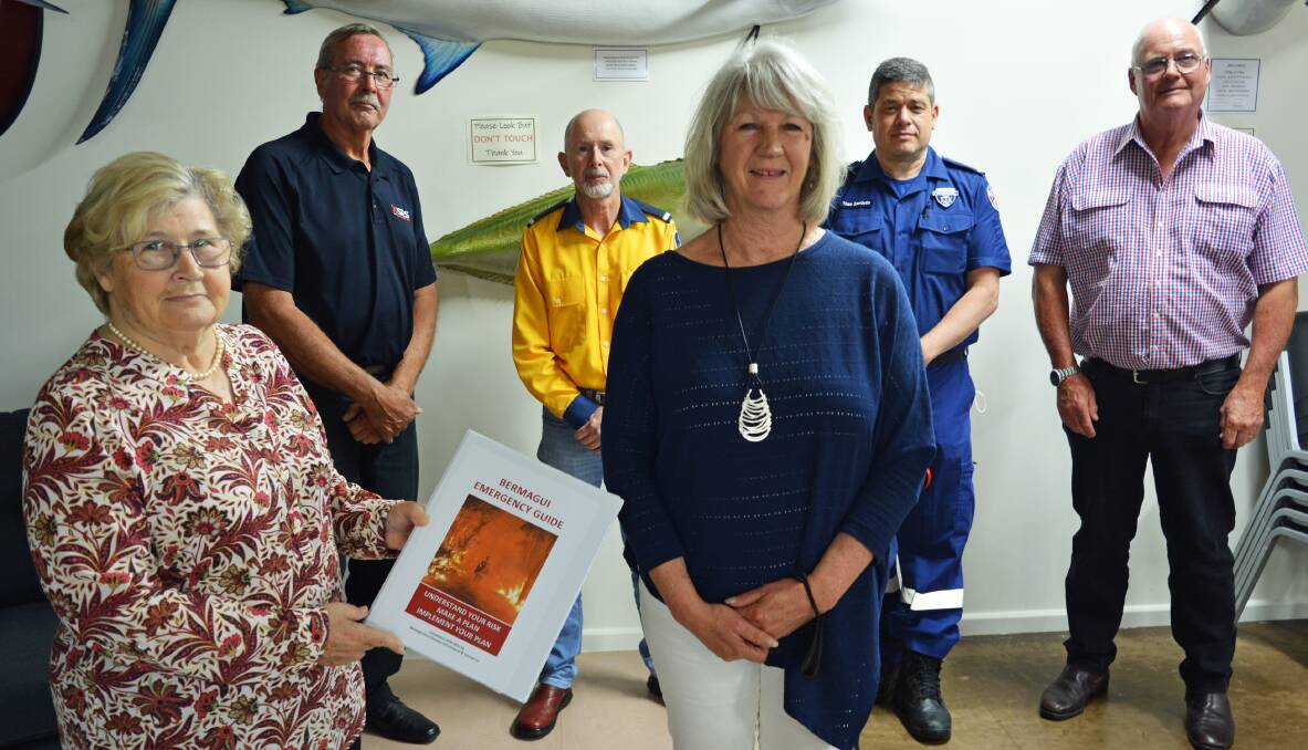 At Thursday's launch of the Bermagui Emergency Guide are Janette Neilson and Christine Bimson with John Mills (SES), Lewis Gaha (RFS), Theo Zantiotis (NSW Ambulance) and Allan Douch.