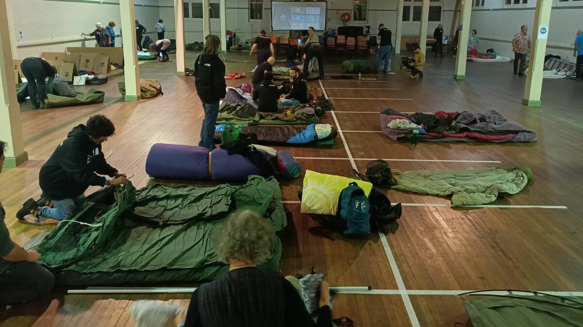 Bedding down for the night in the Bega Showground pavilion for the Sleep On It Challenge in April 2022. Photo: Ben Smyth
