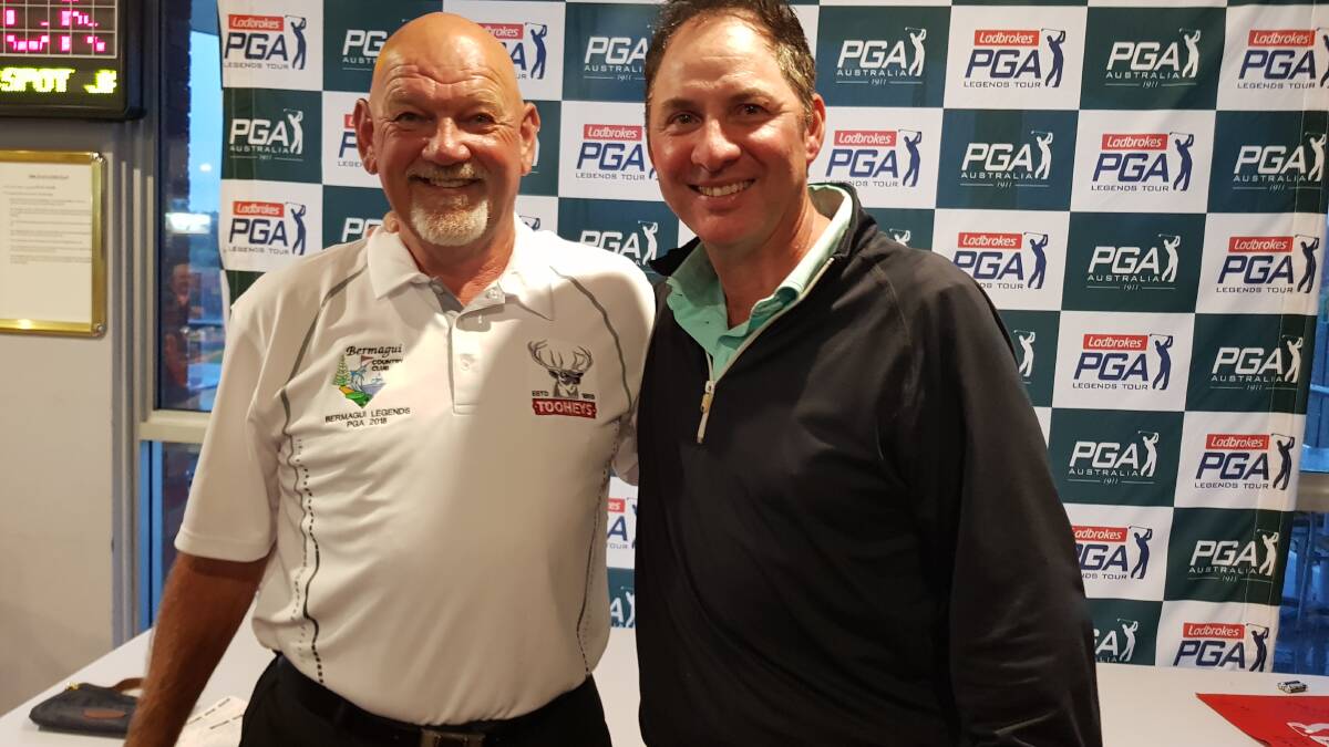 Bermagui's tournament director Derek Quinto congratulates the PGA Legends Pro Am winner Lucien Tinkler.