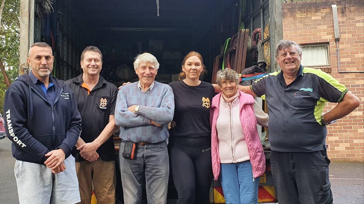Margaret-Anne Hayes with some Transport Workers Union members load the truck bound for Cobargo. Photo: Supplied