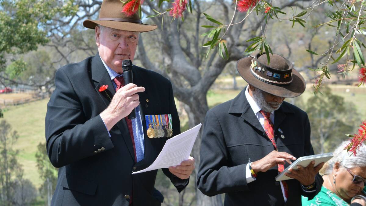 Colonel Peter Florance of Bega Valley Legacy gives David Mullett an official RSL dedication. Picture by Ben Smyth