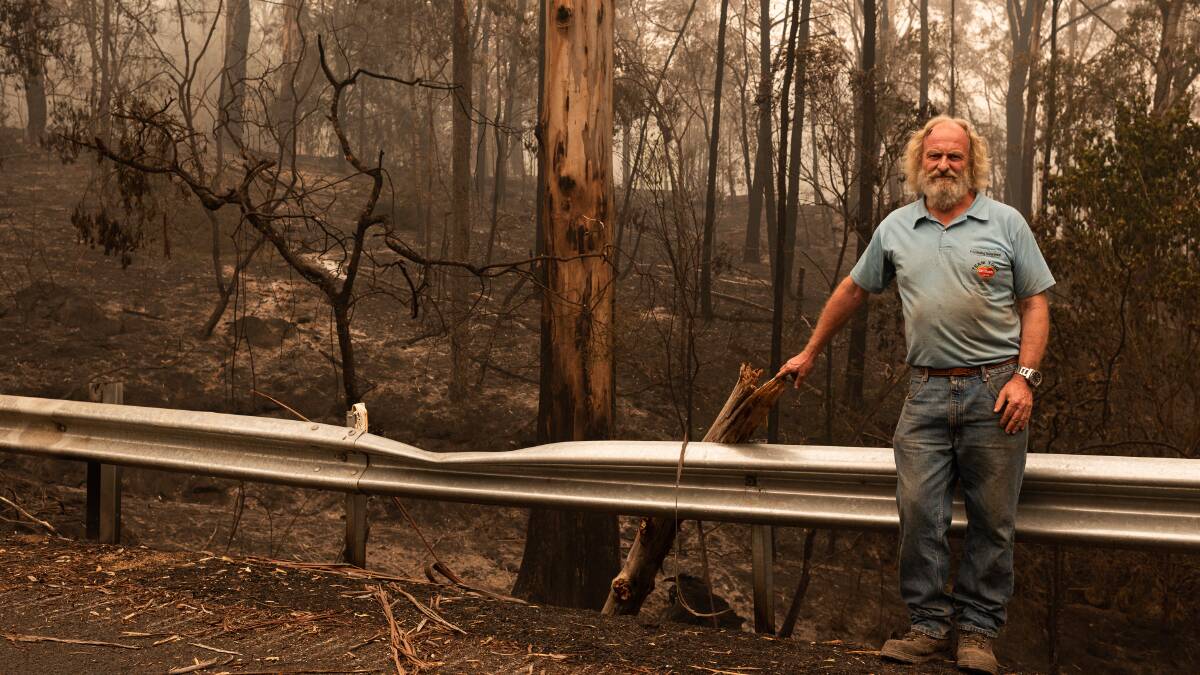James Smith stands in front of his property on Myrtle Mountain Road, Wyndham, NSW, January 2, 2020. Photo Michael Weinhardt