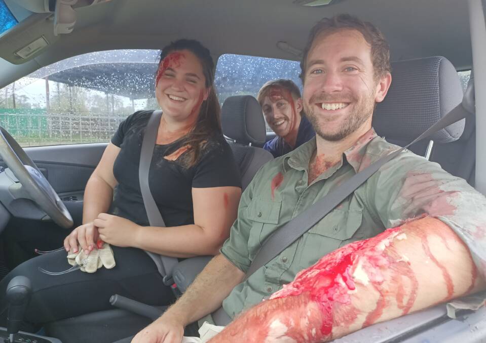 The happiest car crash 'victims' you're likely to meet. Bega doctors play their part in Thursday's mock emergency scenario for ANU medical students. Photo: Ben Smyth