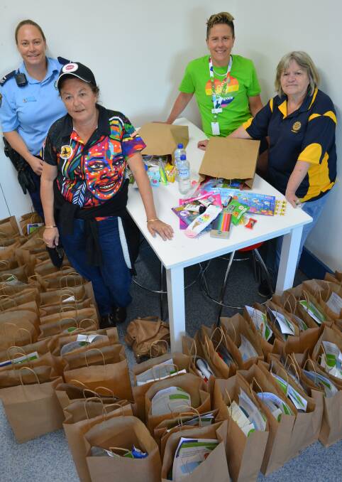 BAGS OF FUN: NSW Police youth case manager Sarah Bancroft, Ronnie Docker from Katungul, Liz Scott from Headspace Bega and Beth Moore of Pambula Rotary.