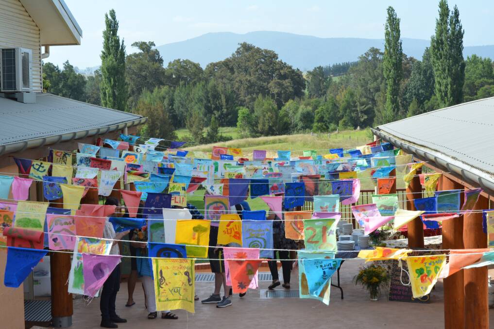 IN SYNC WITH SURROUNDINGS: Mumbulla School celebrates its 30th birthday with the sacred Mumbulla Mountain in the background. Photo: Ben Smyth