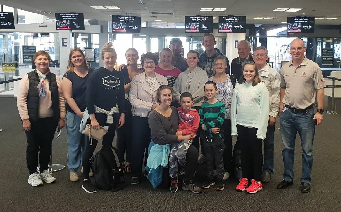 Members of the Bega Littleton Citizens Exchange group pose at the airport on Sunday before departing for their Sister City tour.
