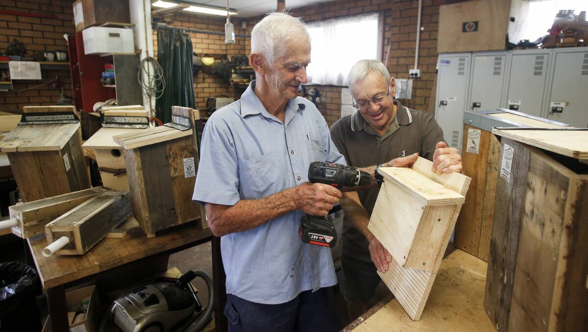 NEST BOXES: Men's Shed members Rusty Powell and Ross Prendergast build wildlife nesting boxes. A workshop on the process is being held at Cobargo this month.