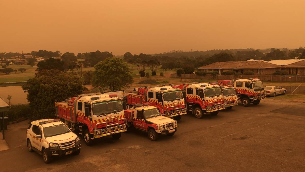 Firefighting vehicles parked outside the Bermagui Country Club.
