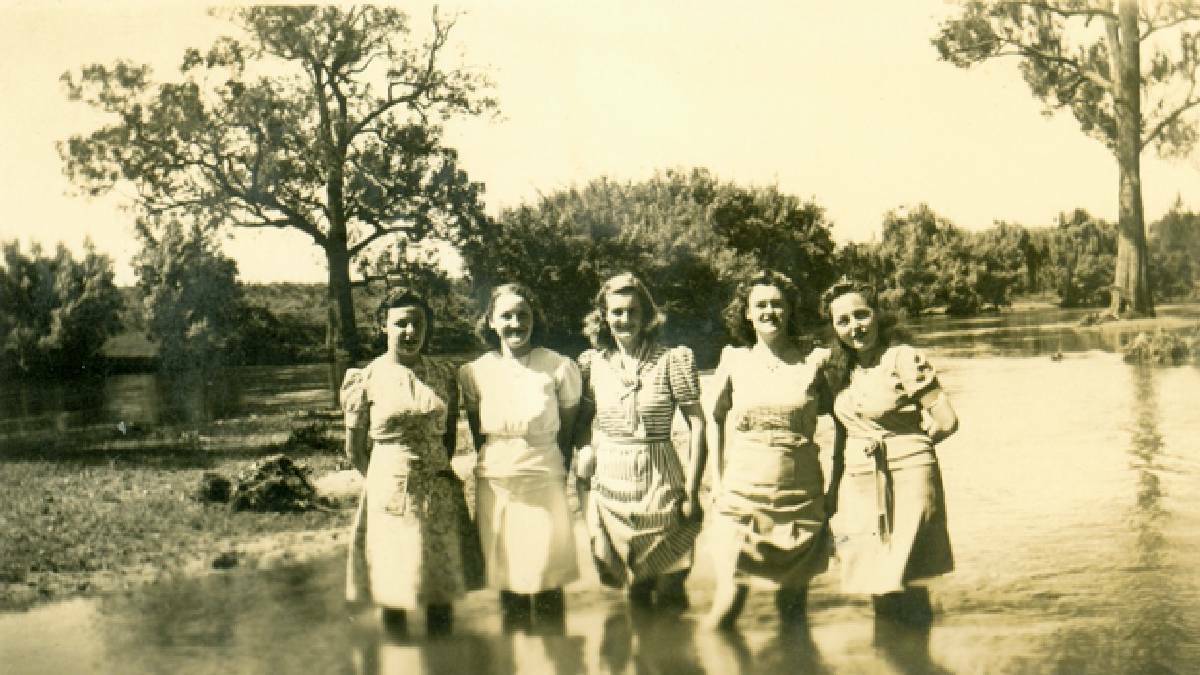Wading in the Bega River, circa 1940.