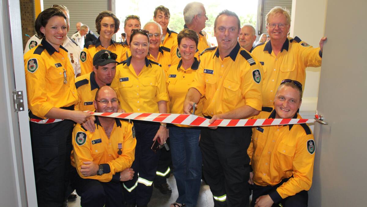 NEW DIGS: Merimbula Rural Fire Service brigade members officially open their new station extensions on Saturday. Picture: Ben Smyth