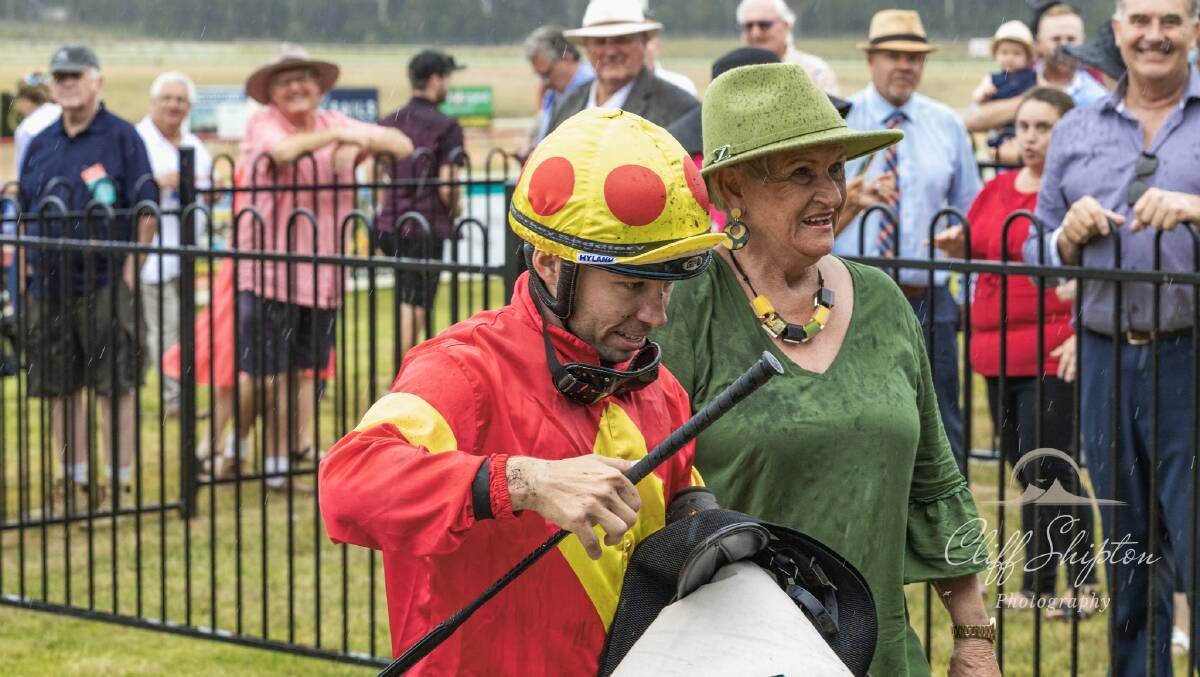 Quayde Krogh is led to weigh-in by ecstatic stable owner Barbara Joseph. Picture by Cliff Shipton Photography