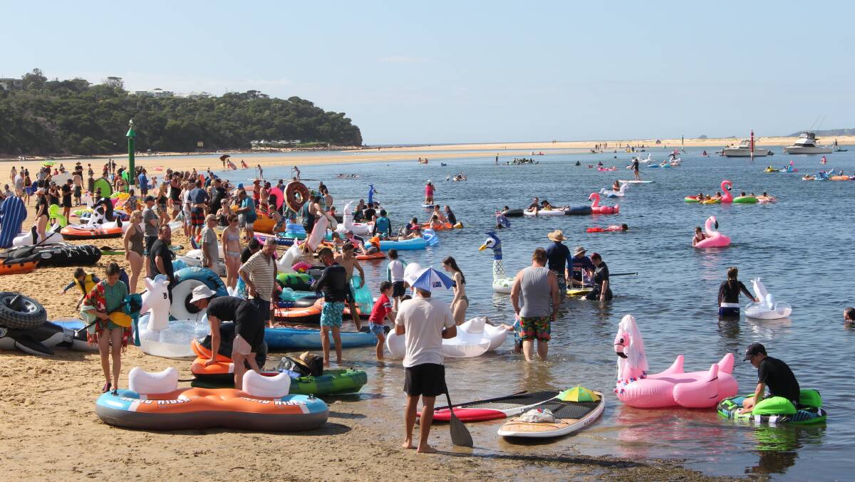Participants in the annual Merimbula Float on Australia Day pull into Spencer Park. Photo: Denise Dion