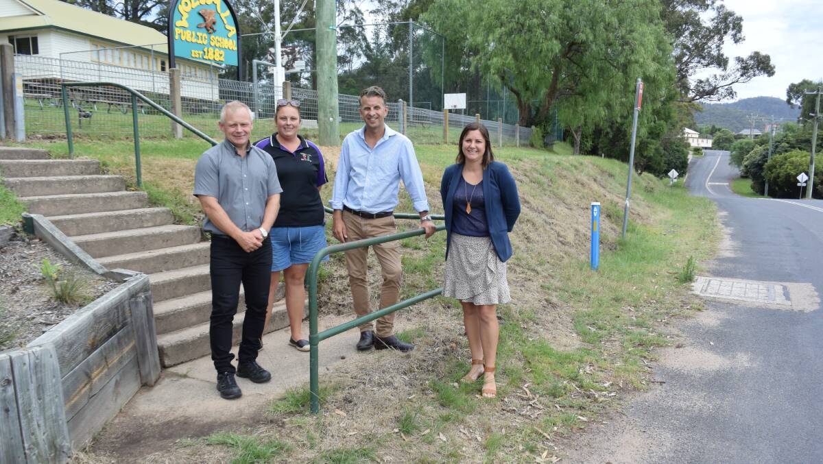 DROP ZONE: Wolumla principal Peter Claxton and parent rep Kellie Rosseland show the potentially unsafe school entrance to Bega MP Andrew Constance and Mayor Kristy McBain on Friday.