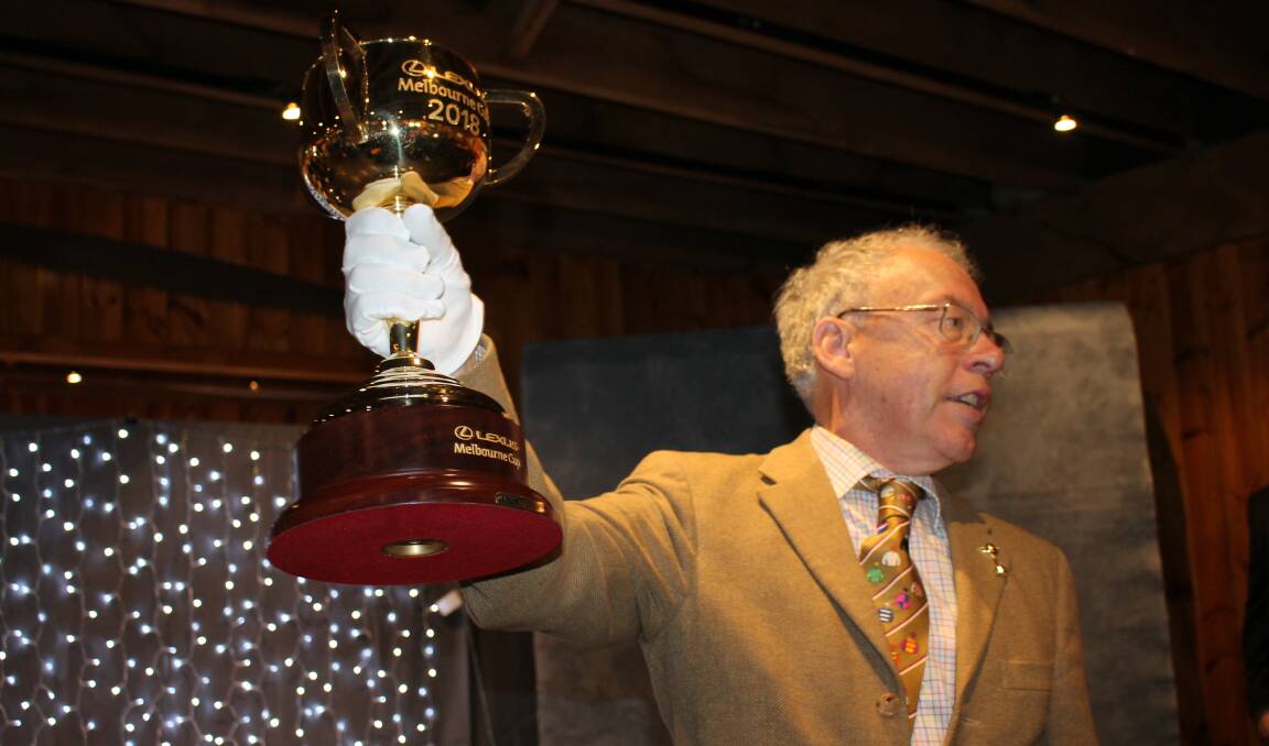 Melbourne Cup historian Andrew Lemon and the famed trophy during a previous visit to Bega. Photo: Ben Smyth