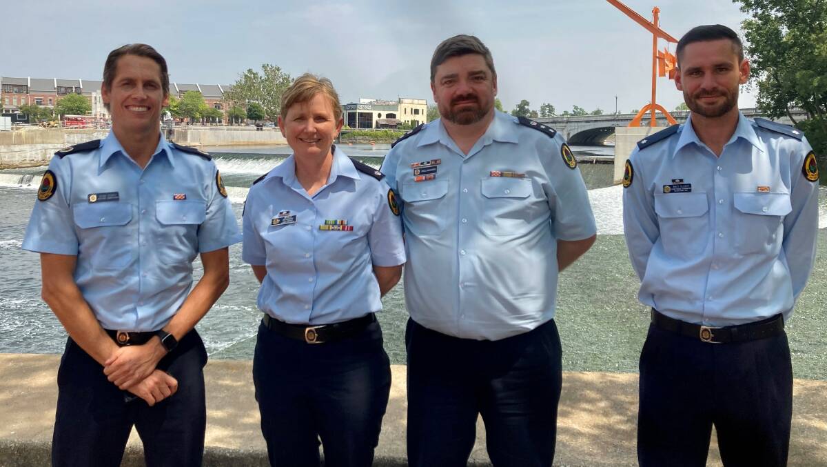 NSW SES director of operations, capability and training Assistant Commissioner Dean Storey, Sapphire Coast commander and in-water flood rescue operator trainer Michelle De Friskbom, senior manager of training delivery Paul McQueen, and Blacktown unit in-water flood rescue operator trainer Matthew Elliot in America. Picture supplied