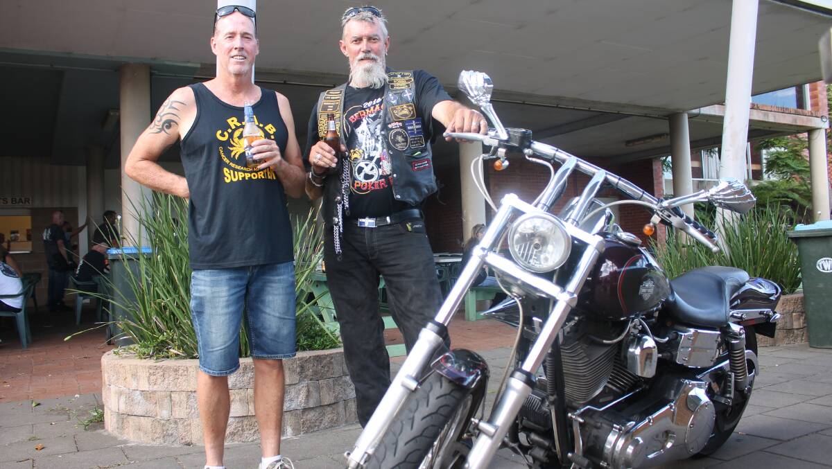 Event organiser Dave Thomson and Rob Grimstone of CRABs enjoy a beverage following the inaugural poker run in 2018.