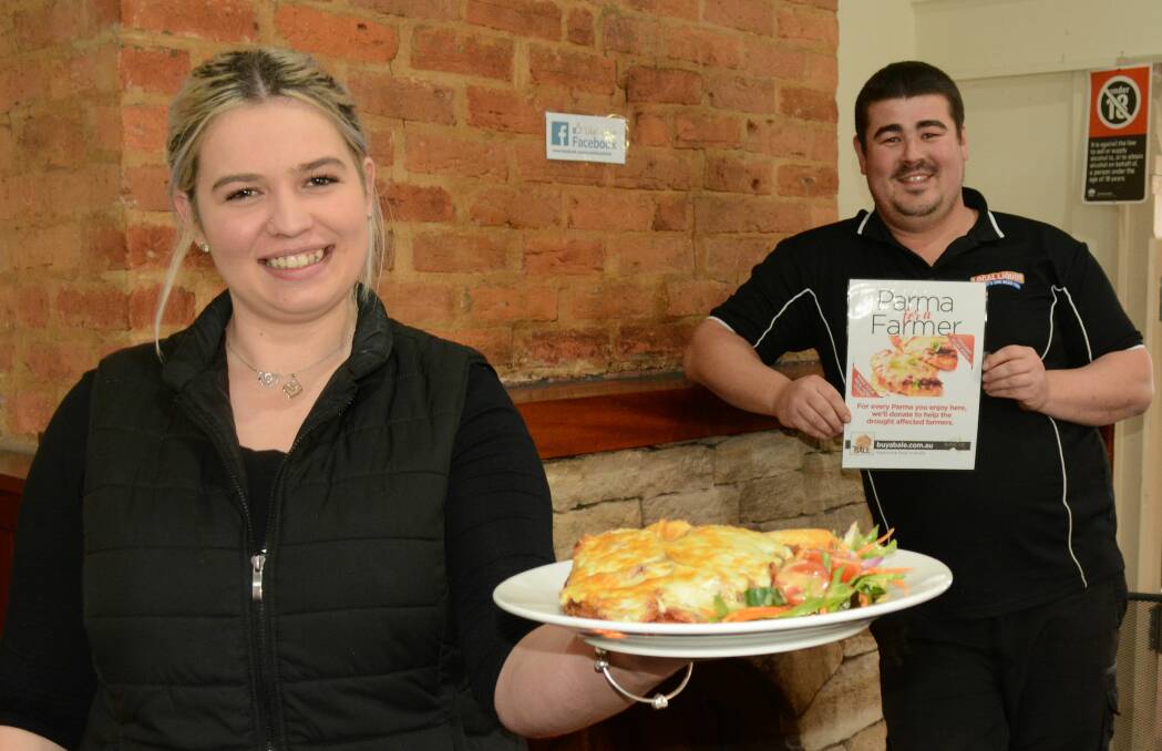 Emalee Turner and Sean Stolzenhein at EMZ Bite in Pambula have signed on to Parma for a Farmer, where $1 from every parmigiana sold goes towards drought relief.
