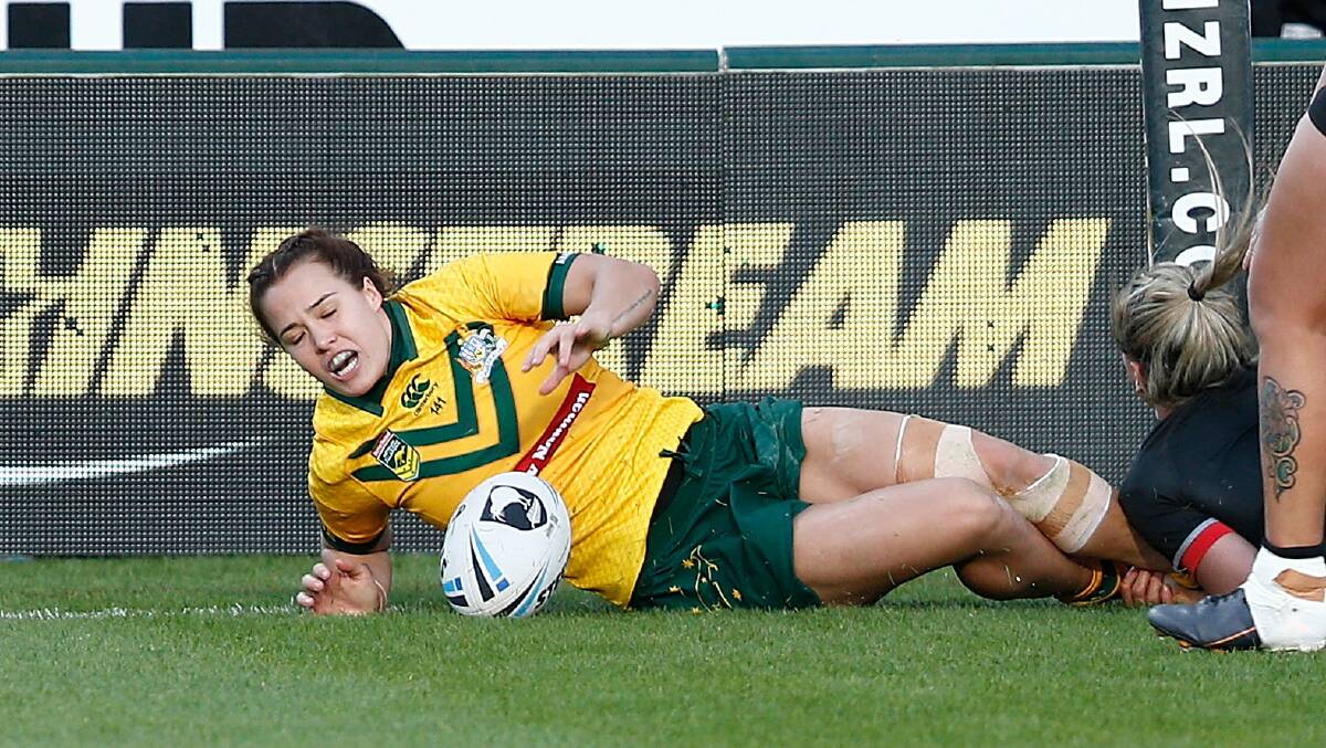 Isabelle Kelly of Australia scores the winning try. Picture: AAP