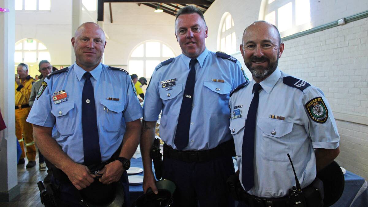 ROLE MODEL: At the NSW Premier's thank you gathering following the Tathra region bushfires in 2018 is South Coast Police District chief inspector Peter Volf, along with sergeant Adam Kite and senior constable Brad Ross.