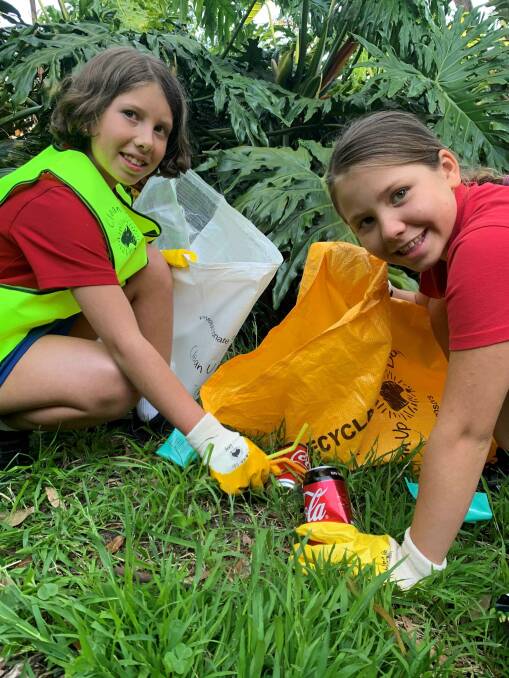 April and Astrid Gordon help Clean-up Australia.