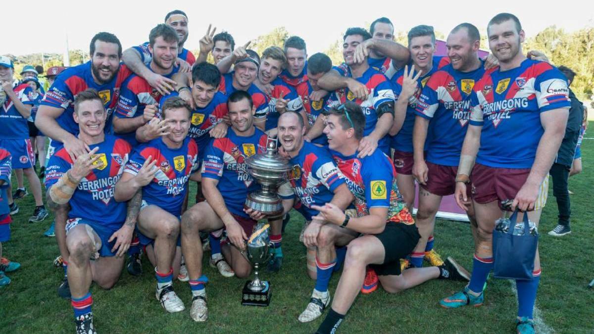 Jack Murchie, Reuben Garrick and their Gerringong Lions side after defeating the Shellharbour Sharks in the 2015 Group Seven grand final. Photo: David Hall