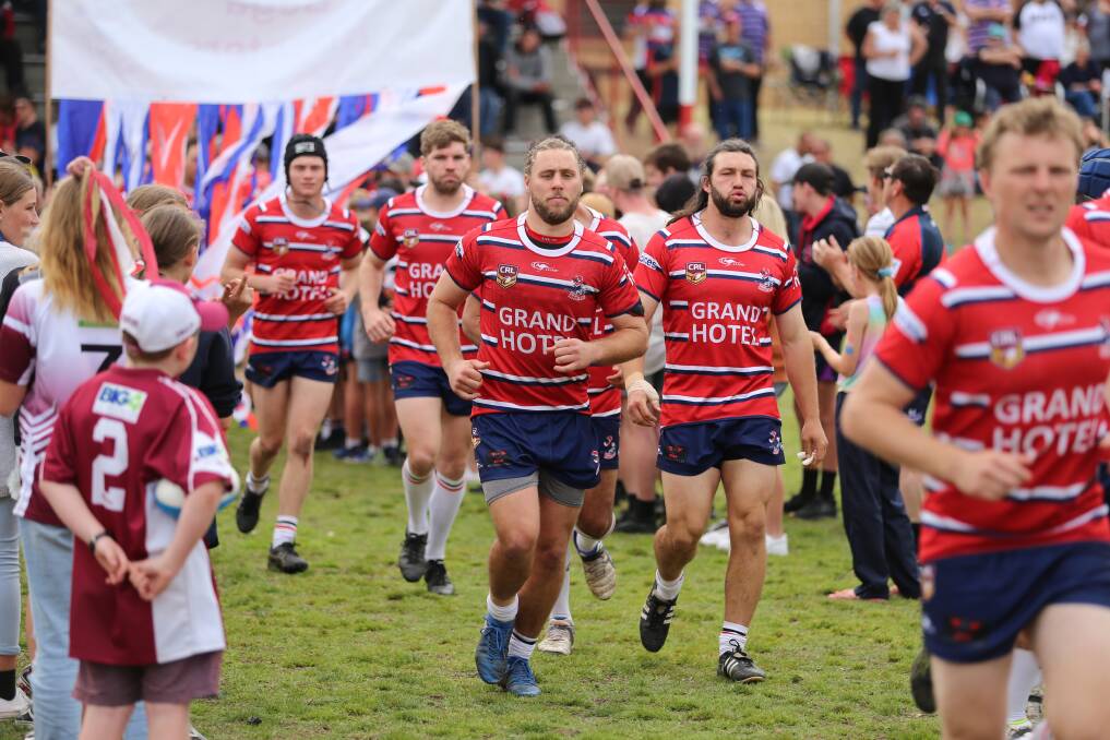The Bega Roosters run out on their grand final day, 2019.