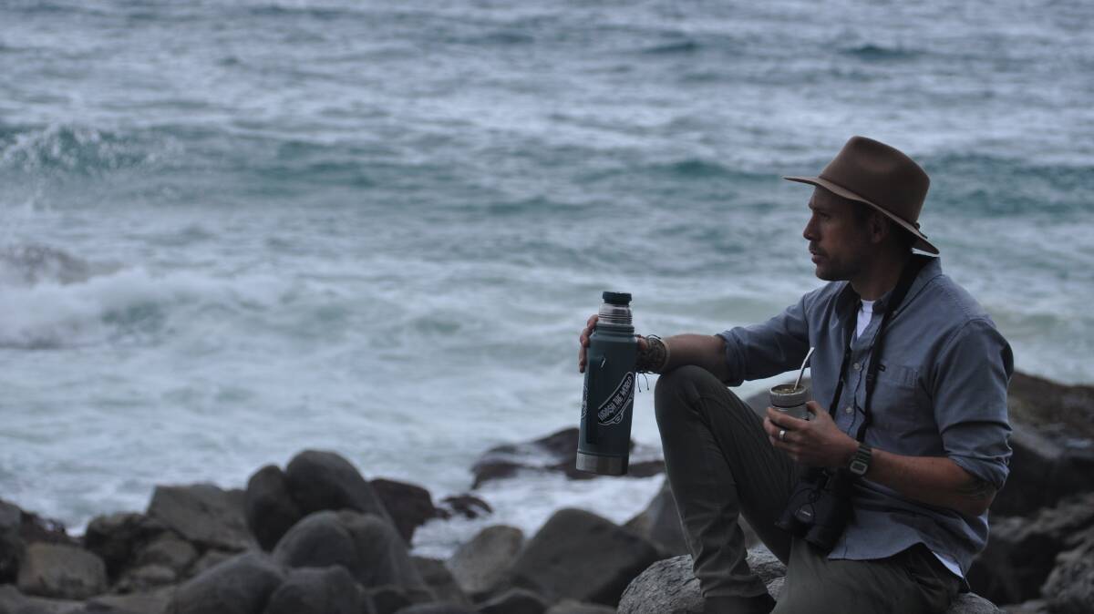 Chris Theobald sips his Yerbe Mate tea at his hometown of Tuross Head. 