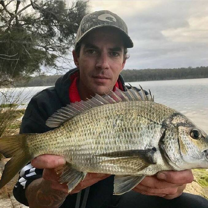 Narooma's Liam McNeilly, an avid fisherman, remains in a critical condition five days after an alleged one-punch assault in Queensland.