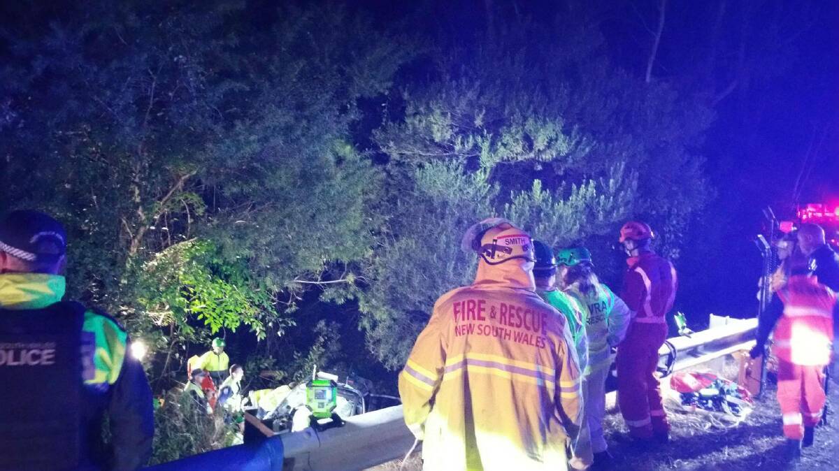 Emergency crews working to free the trapped woman on the Princes Highway, Thursday, June 6. Picture: NSW Fire and Rescue.