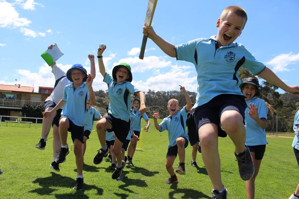 Pambula public school pupils loving a day full of cricket.