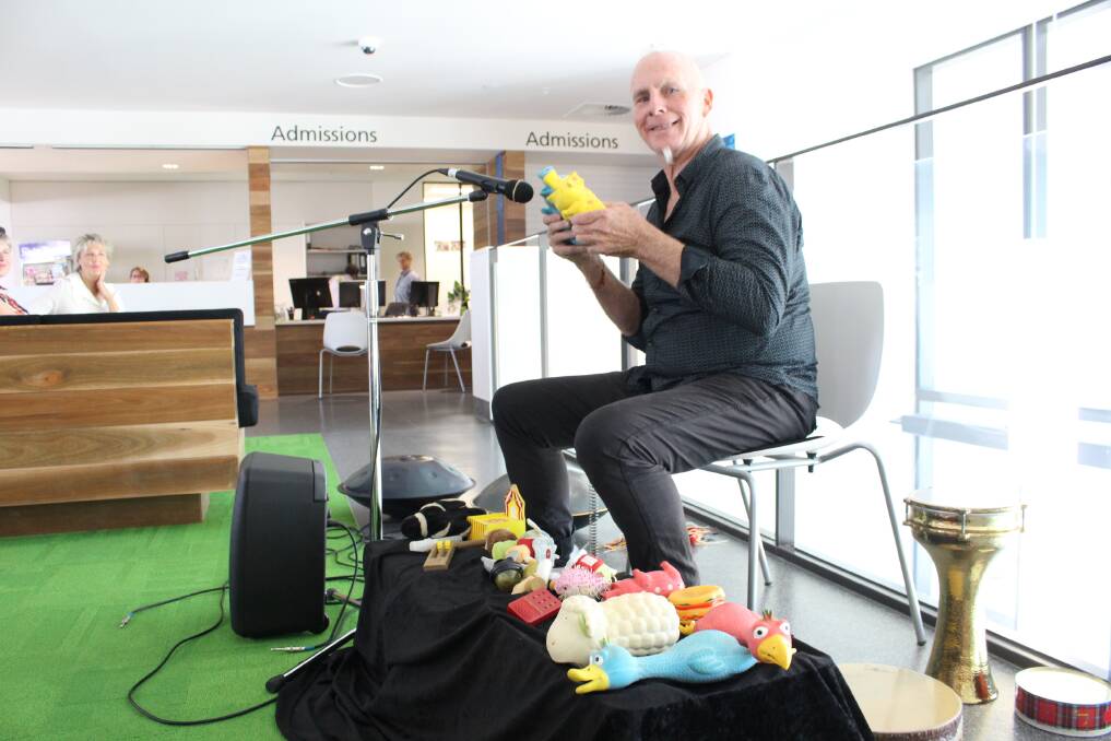 Silly sounds: World-renowned percussionist Greg Sheehan plays an array of instruments - the squeaky toys were a crowd pleaser.