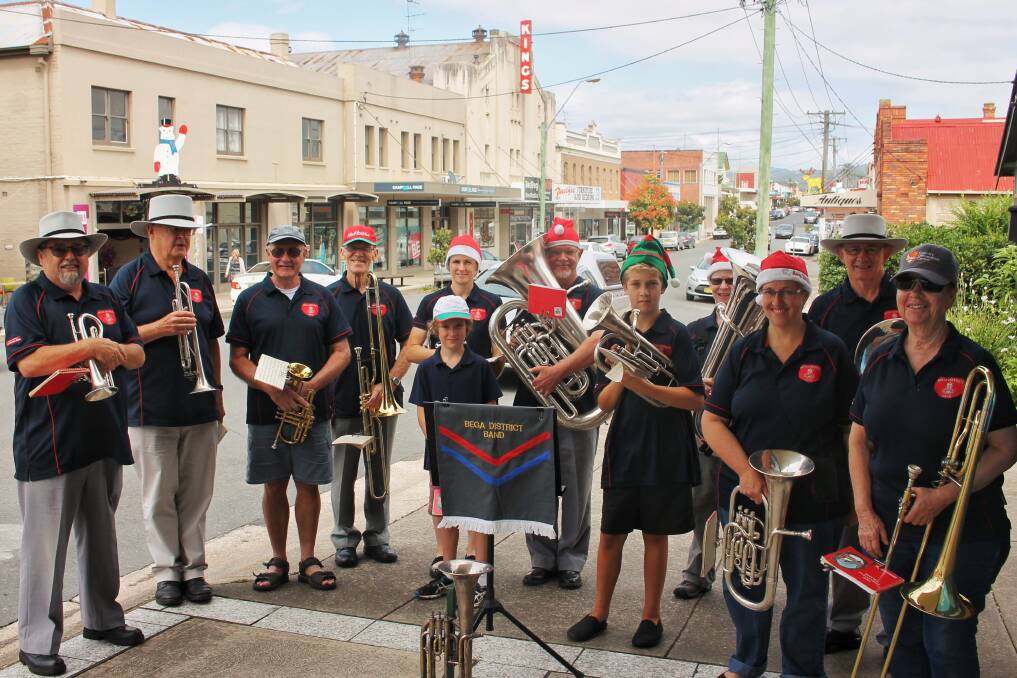 The Bega District Band perform along Carp Street, Bega to spread Christmas cheer on Thursday, December 21. 