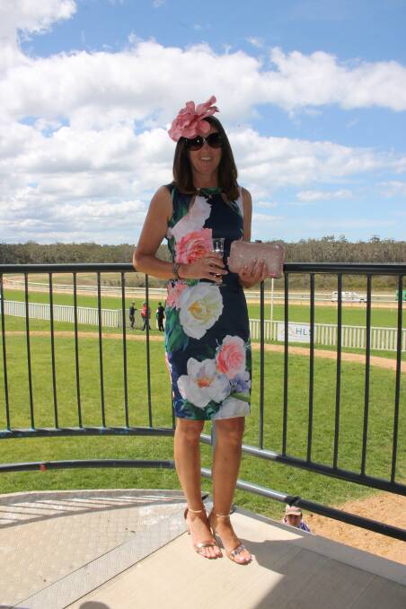 The people's choice: Jayne Henry of Bemboka wins our People's Choice Award for her floral number worn on Melbourne Cup Day at Sapphire Coast Turf Club.