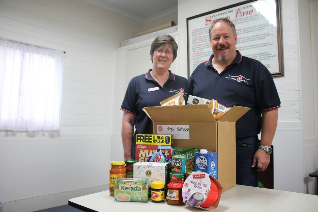 WHAT'S IN THE BOX: Deb and Rod Parsons have started packing hampers for Christmas. 