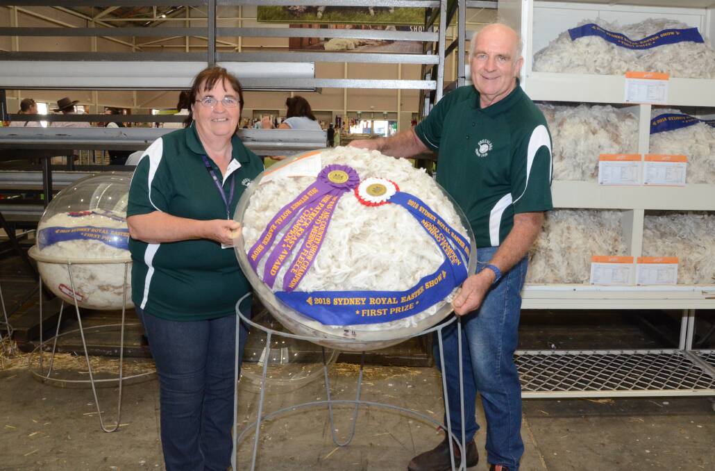 Jenny and John Alcock, Greenland stud, Bungarby, with their grand champion fleece from show society class.