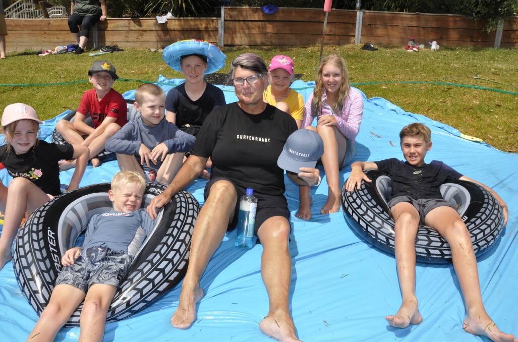 Goulburn East Public School learning support officer and cancer survivor, Kim Hall, with students participating in SurFebruary on Friday. Picture by Louise Thrower.