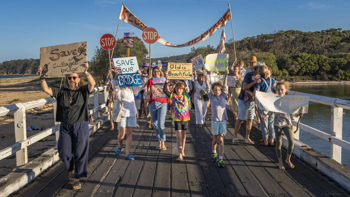 The community marched to save the timber bridge in March 2021. Picture by David Rogers