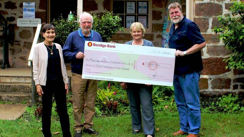 Museum curator Liz Bretherton (left) and president Don Bretherton are pictured accepting the cheque from Debbie Cusack and Graham Stubbs of Bendigo Bank. 