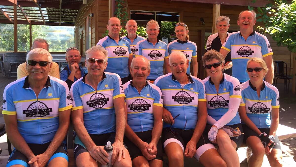 David Brand, back row second left, with cycling friends and wife Louise, front right.