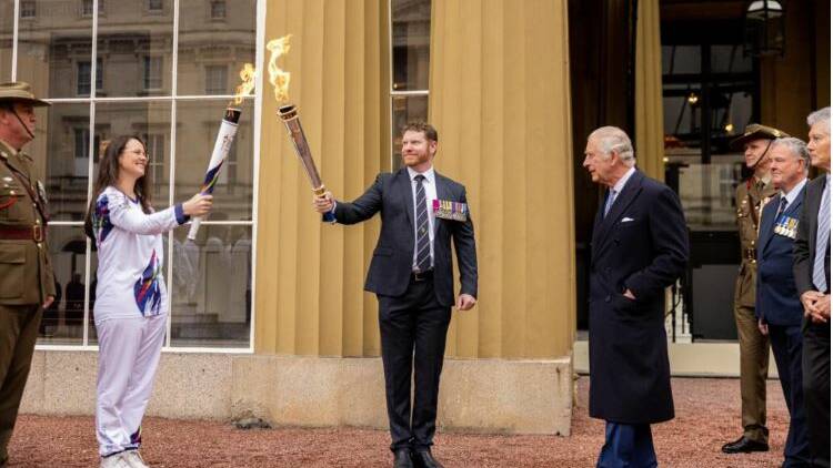 King Charles III watched torch bearers light the flame outside Buckingham Palace to mark the start of the relay in London. He was joined by veterans, widows and children from the London Legacy Club as well as volunteers who help support these families. Australian Victoria Cross recipient Daniel Keighran was also in attendance and presented The King with a Legacy Centenary Commemorative Torch.