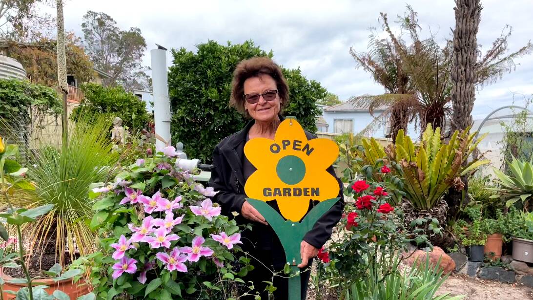 Eden Open Garden Day organiser Sandra Symonds in her own garden with one of the display posts which will denote an open garden. Picture by Denise Dion