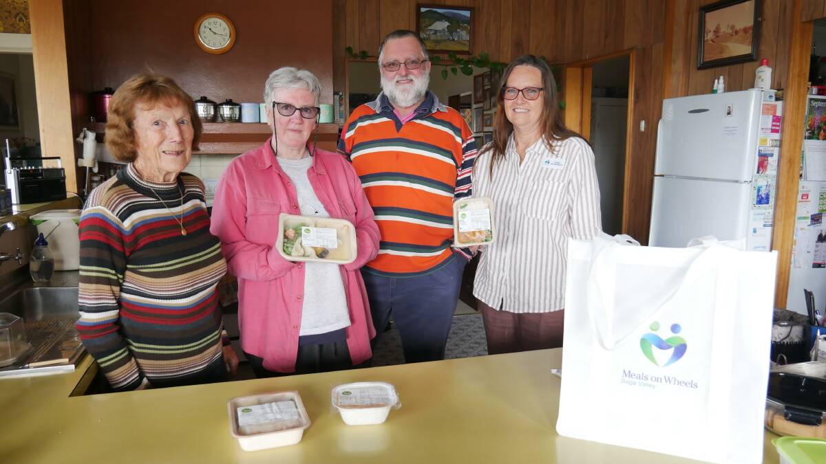 Bega Valley Meals on Wheels client Gwen Eadie, with volunteers Leanne and Peter Jackson, and Meals on Wheels social support coordinator Chris Bowerman in September 2022. Picture by Ellouise Bailey
