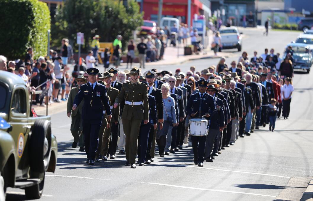 ANZAC DAY MARCHES THREATENED: Veterans, their families and school students marching in the 2021 Anzac Day march in Merimbula. Photo: Jacob McMaster