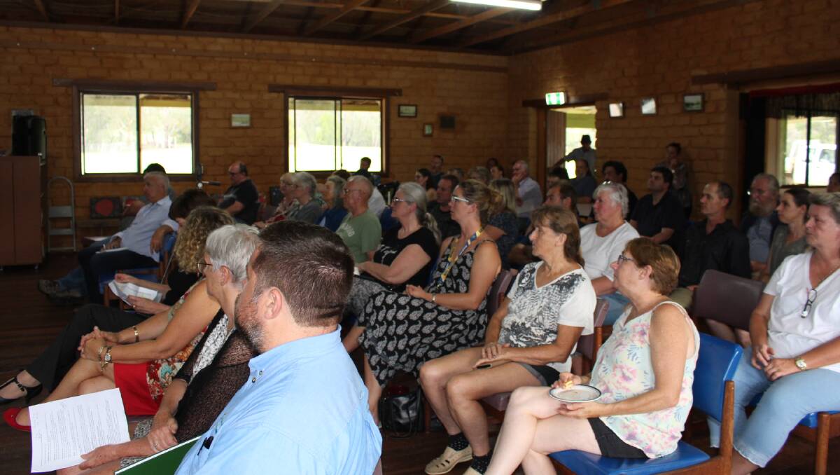 A council meeting at Towamba Hall with residents, councillors and council staff, following the bushfire crisis.