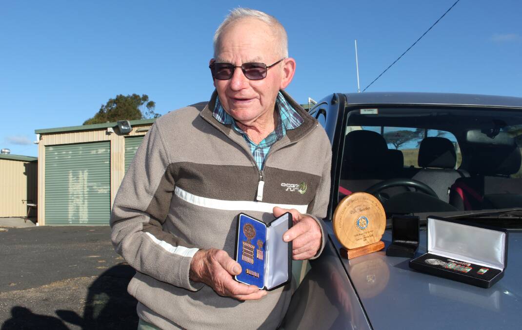 Robbie Thatcher with some of his previous medals including the NSW RFS Award, long service medals, the National Medal 4th Clasp and the Rotary Club of Bega Service in Action Award 2009 for 'Service Above Self'.